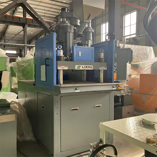 Hybrid vertical injection molding