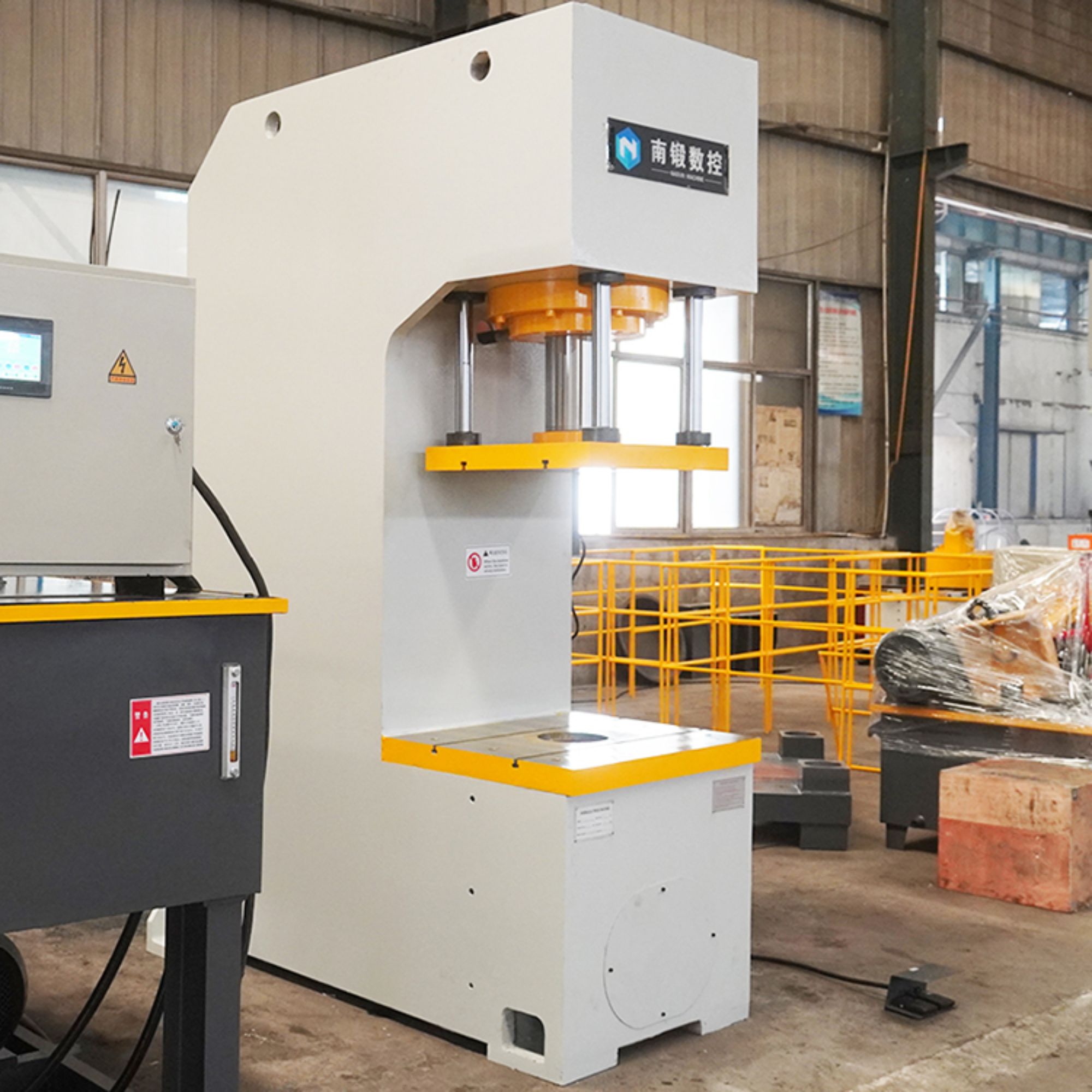 What are the maintenance requirements for a 200-ton C-frame hydraulic press to ensure optimal performance?