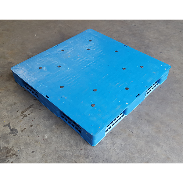 The Envelope of Plastic Pallets at the Brand New Warehouse Storage and Transportation