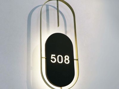 What Makes Hotel Room Number Plates Both Functional and Stylish?