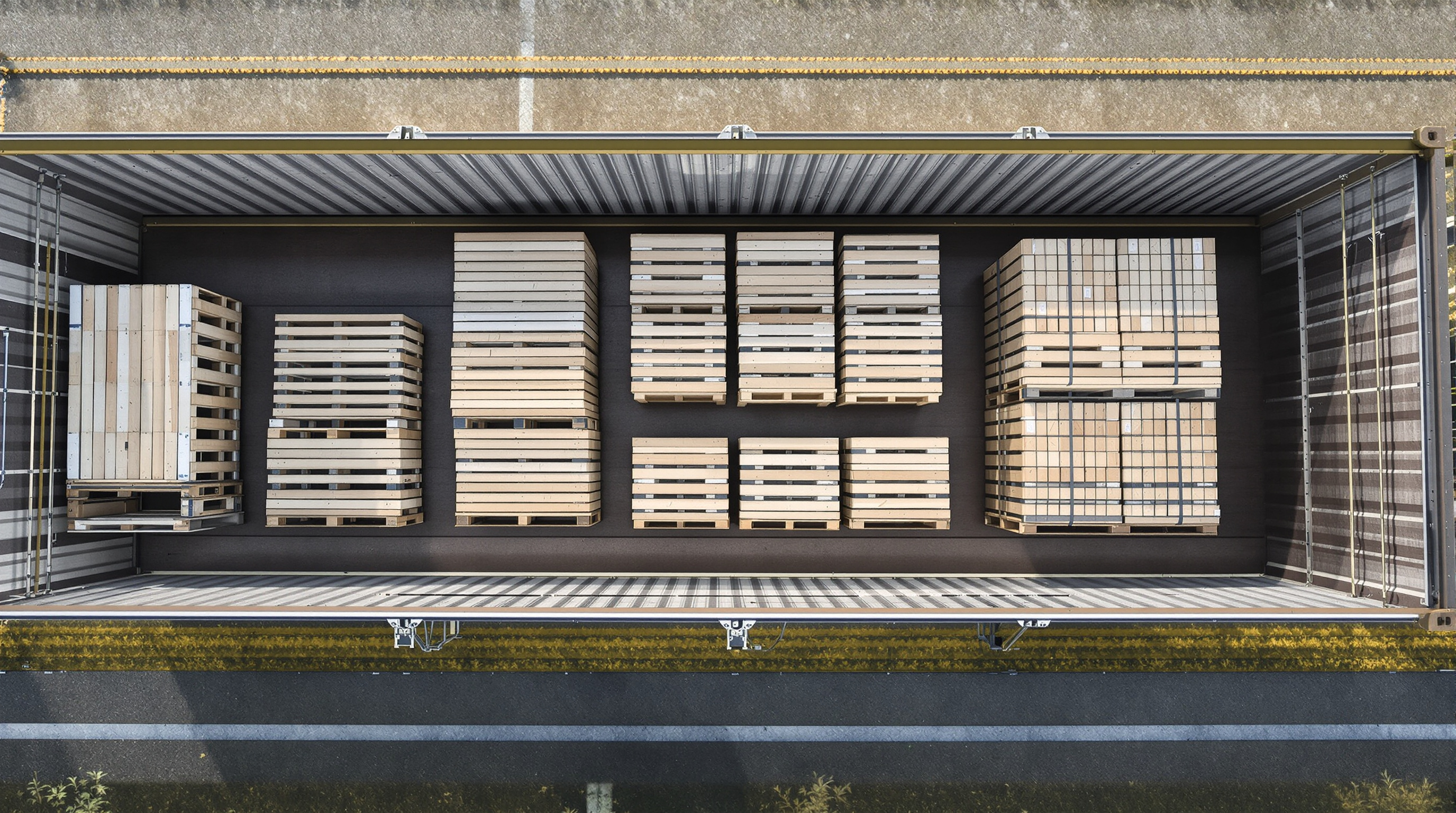 Overhead of container trailer showing balanced palletized cargo weight distribution
