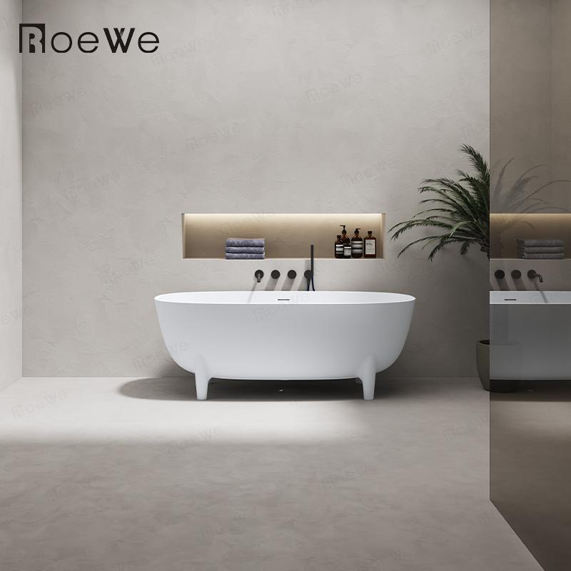 mattweißer Kunstoffstein-freistehende Badewanne mit Beinen