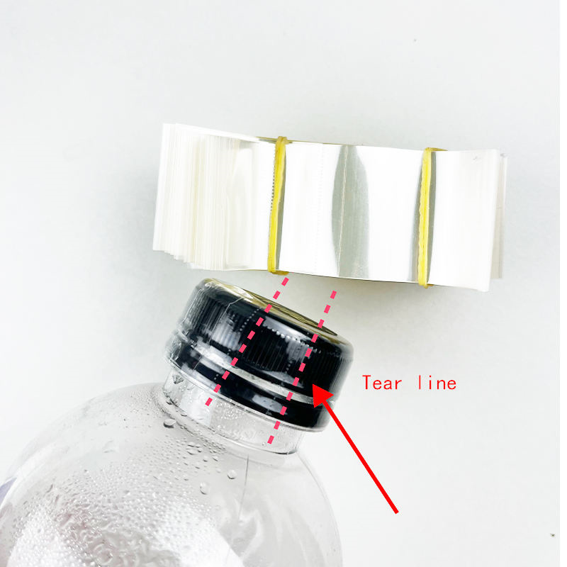 Folia do etykiet perfrowana, opakowanie termokurczliwe do butelek, uszczelka na nakrycie, folia termokurczliwa