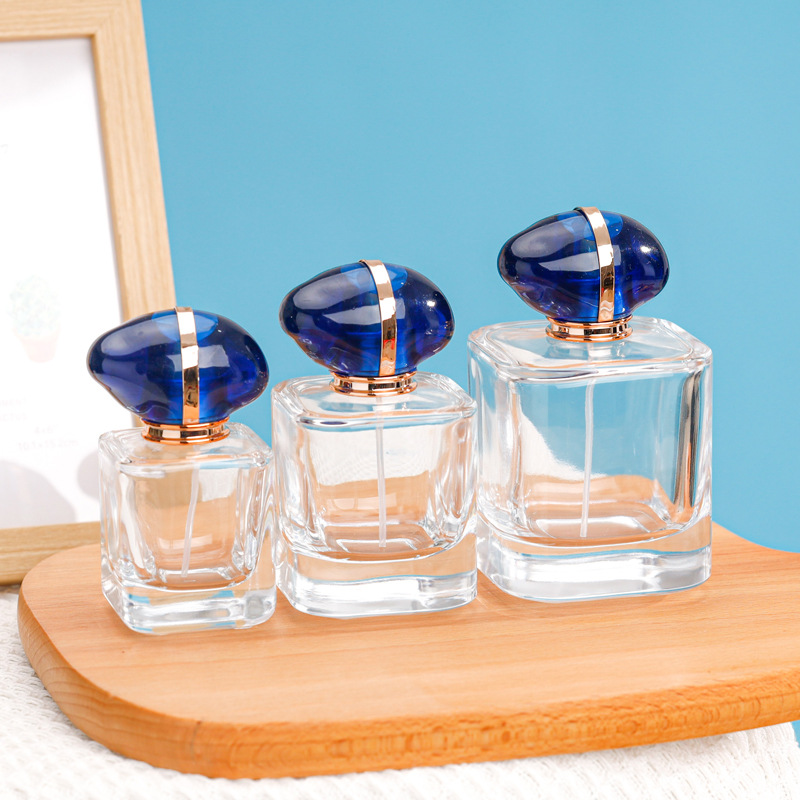 50ml 100ml בקבוק סprüי לבושם שקופ מרובע בקבוקי זכוכית לבושם