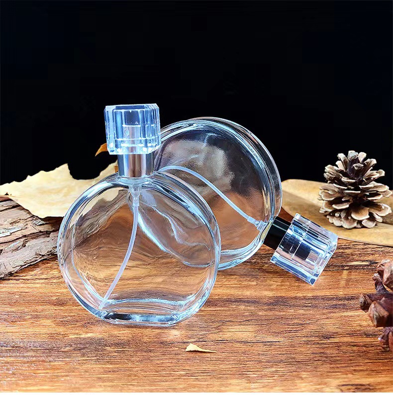 زجاجة عطر زجاجية مستديرة الشكل بسعة 50 مل و100 مل