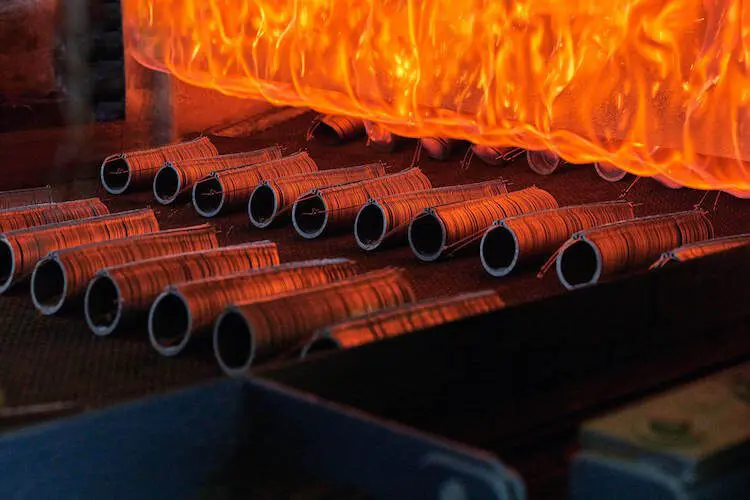 Why do many carbon steel pipes end fittings need heat treatment?