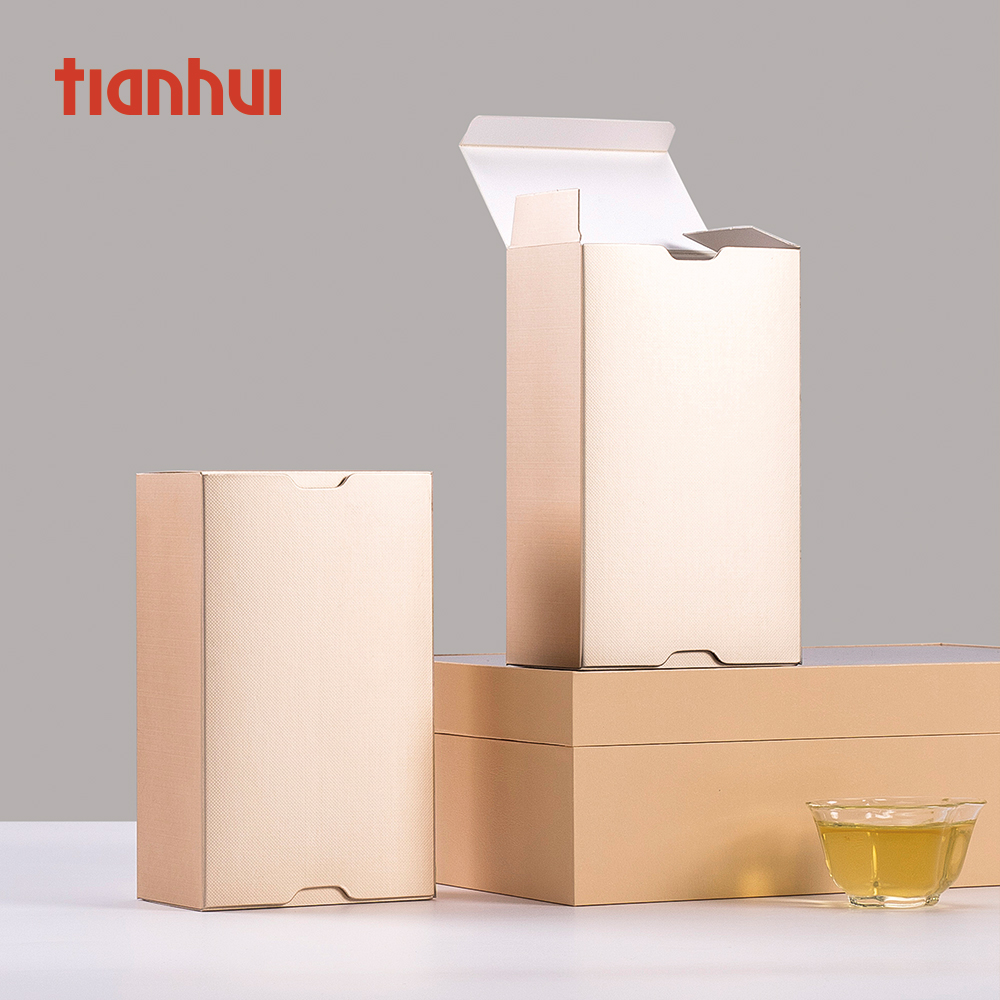 תיבה קומפקטית זהבה לאריזת תה סולב