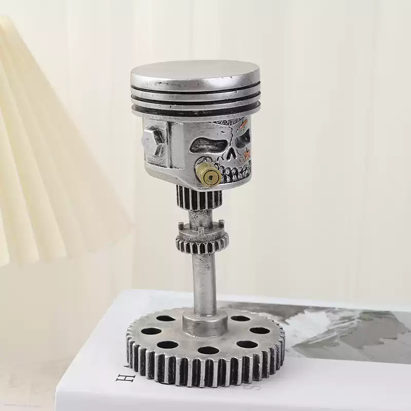 Piston Skull Face Statue