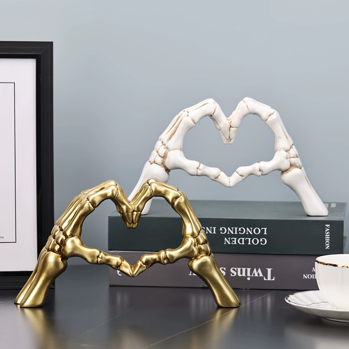 Nordic-style ornament of a skeleton hand bone with a heart shape