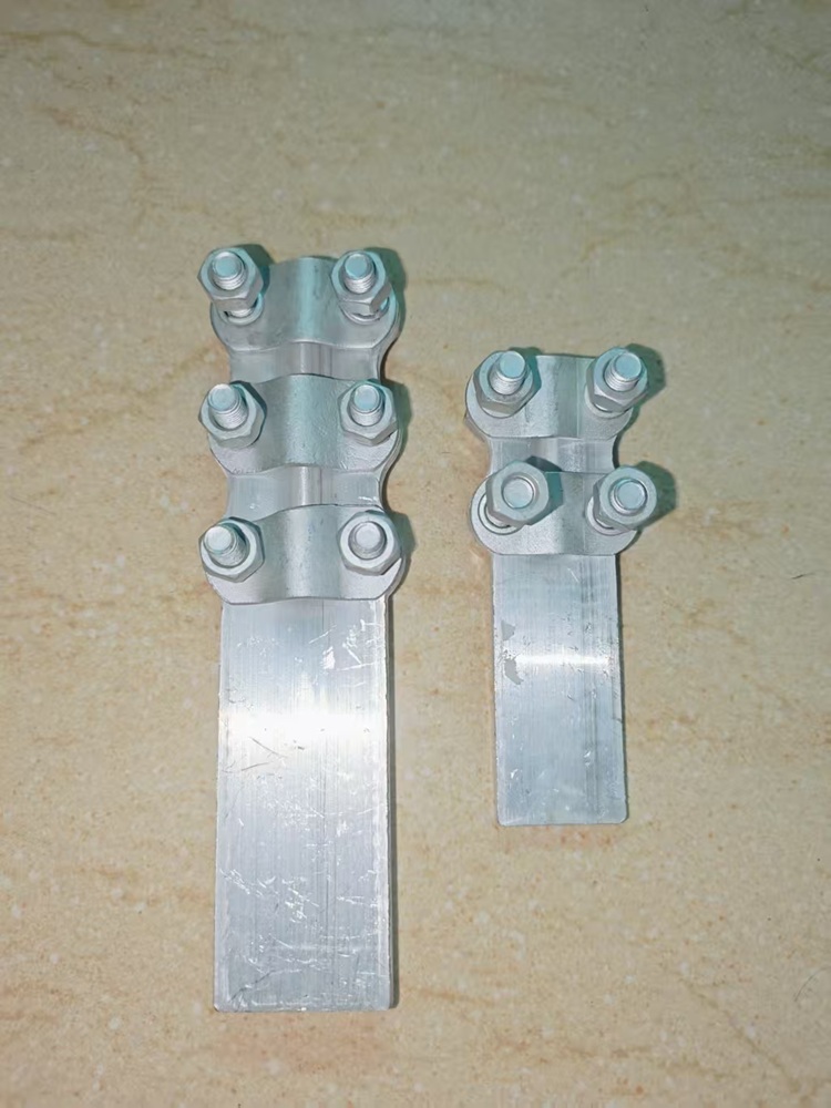 Pinça d'equip (Connector terminal, Cables d'alumini d'alimentació, Pinça de transició de transformador, Fixació)