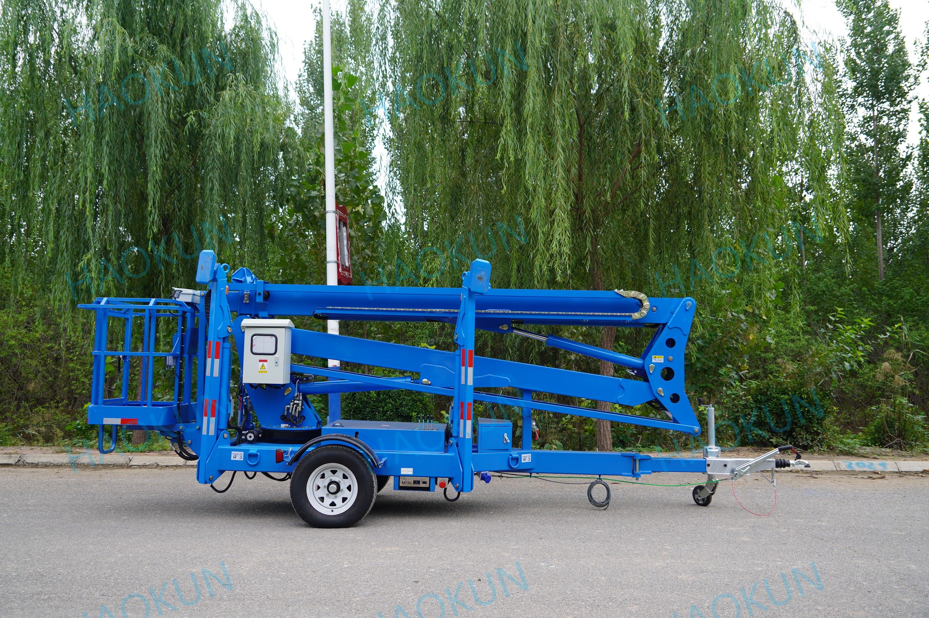 18m Tow Behind Trailer Mounted Boom Lift Telescopic Spider Man Lift for Construction and Maintenance manufacture